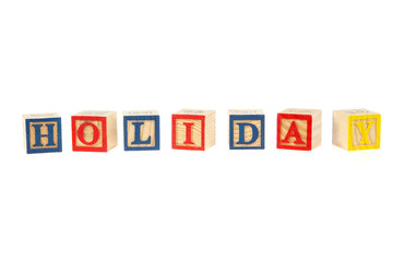 Holiday sign made of wooden bricks