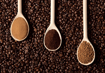 Three types of coffee on coffee beans