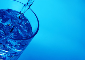 Pouring water into glass