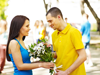 Couple of people on date outdoor.