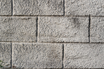 Coarse texture of the old cracked concrete wall