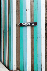 Toilet signpost.