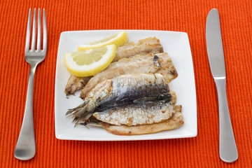 fried fillet of sardines with lemon