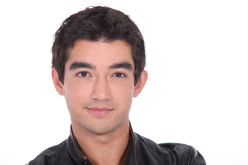 Obraz premium Young man in a leather jacket