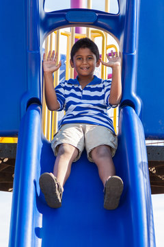 Portrait Of A Cute Little Indian Boy At Playground