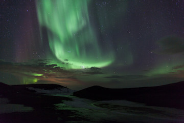 Northern lights over  craters in Iceland