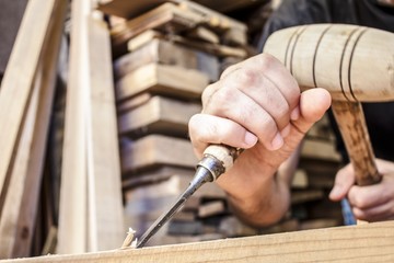 gouge wood chisel carpenter tool working wooden background