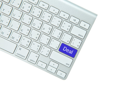 Blue deal button on computer keyboard isolated on white backgrou
