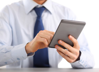 Businessman using computer plane-table