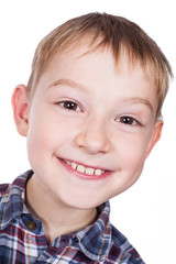 Photo of adorable young boy looking at camera