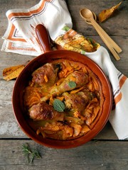 Chicken baked with pumpkin and sage