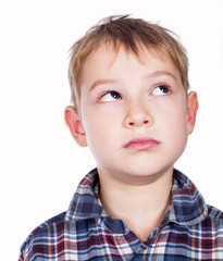 Portrait of boy looking up