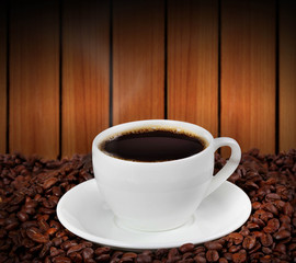 cup of with coffee bean as background