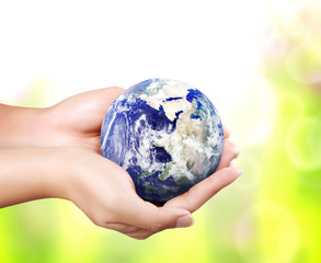 earth in hand (Elements of this image furnished by NASA)