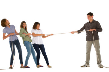 teenagers playing tug of wa