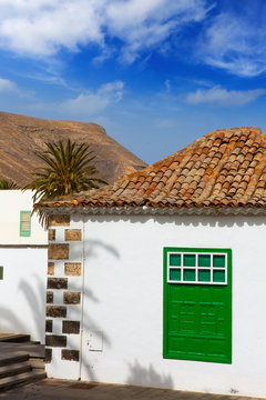 Lanzarote Yaiza white village houses green window