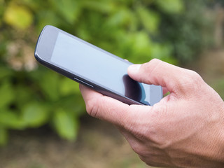 Man hand touching screen on modern mobile smart phone 3