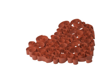 curled red heart made from paper