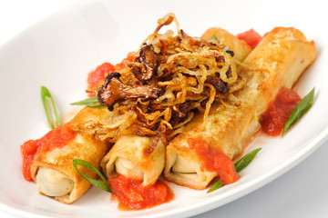 Pancakes with meat, mushrooms and onions