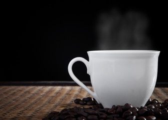 hot coffee with smoke over cup