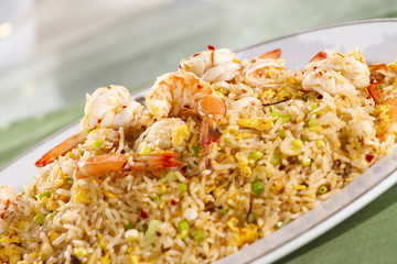Chinese style fried rice with shrimps on top