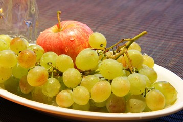 Bunch of grapes and an apple