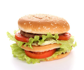 Big and tasty hamburger isolated on white