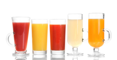 Tropical juices in glasses isolated on white