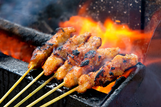 Delicious Asian Cuisine, Malaysia Chicken Satay Cooking on a Hot