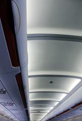 Fototapeta premium the plane corridor ceiling inside