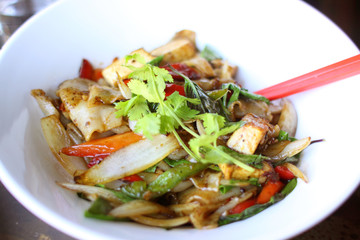 Thai entrée with tofu and pan fried wide rice noodles.