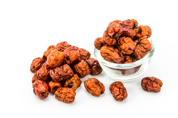 Dried Chinese Jujubes Fruits on white background.