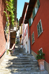 Narrow street of Varenna town at the lake Como, Italy