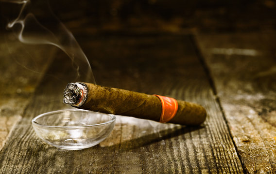 Burning luxury Cuban cigar