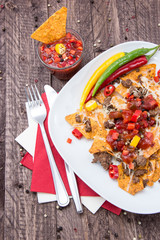 Portion of Nachos with Meat and Cheese