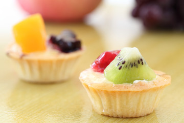 Fruit tart on wood background