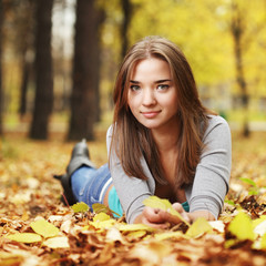 beauty girl in autumn park