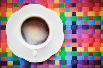 hot coffee and white cup on colorful background