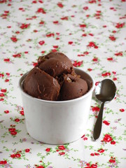 Chocolate Ice Cream with Caramel Bits in a White Ramekin