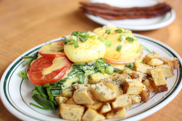 Delicious eggs florentine for breakfast at a restaurant.