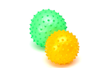 Yellow  and green balls isolated on white