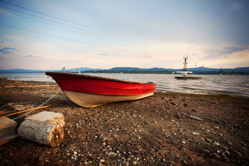 red boat and blue sky