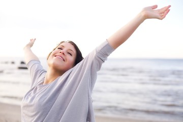 Woman Enjoying the Fresh Air of the Sea