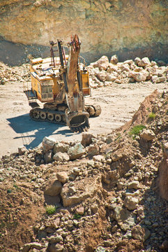 Mining industry - big excavator in open case