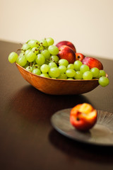 Healthy grapes and geengage in bowl