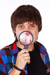 Portrait of handsome gay posing in studio on white background