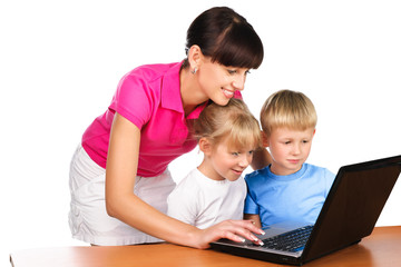 teacher tutoring students with a laptop at table isolated over w