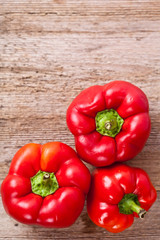 peppers on rustic wooden table
