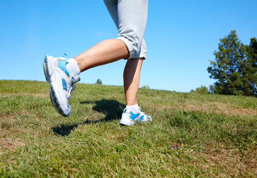 Jogging woman feet.