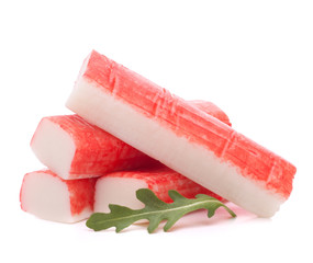 Crab sticks group and rucola leaf